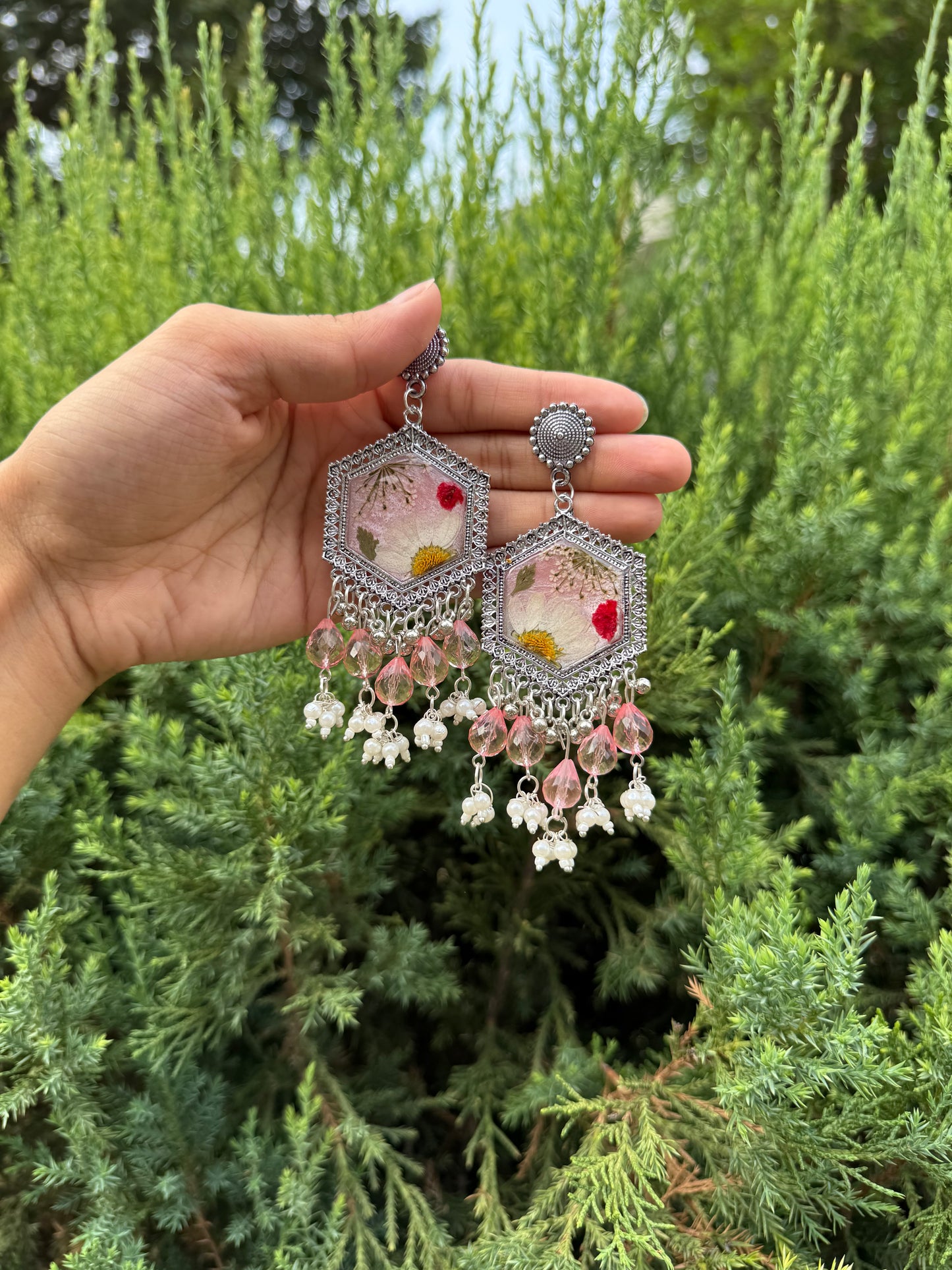 Snow daisy jhumkas