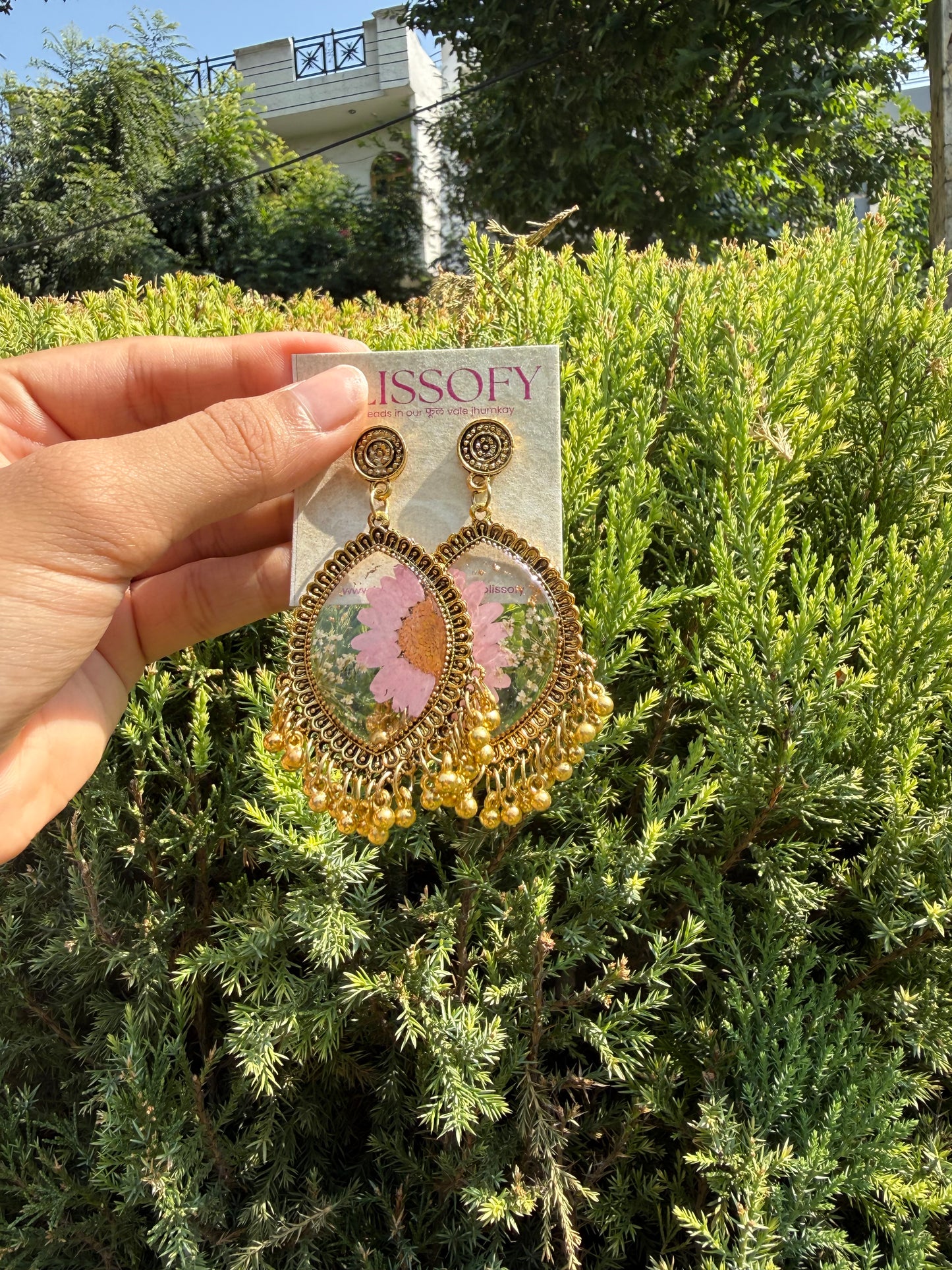 Golden pink daisy jhumkas