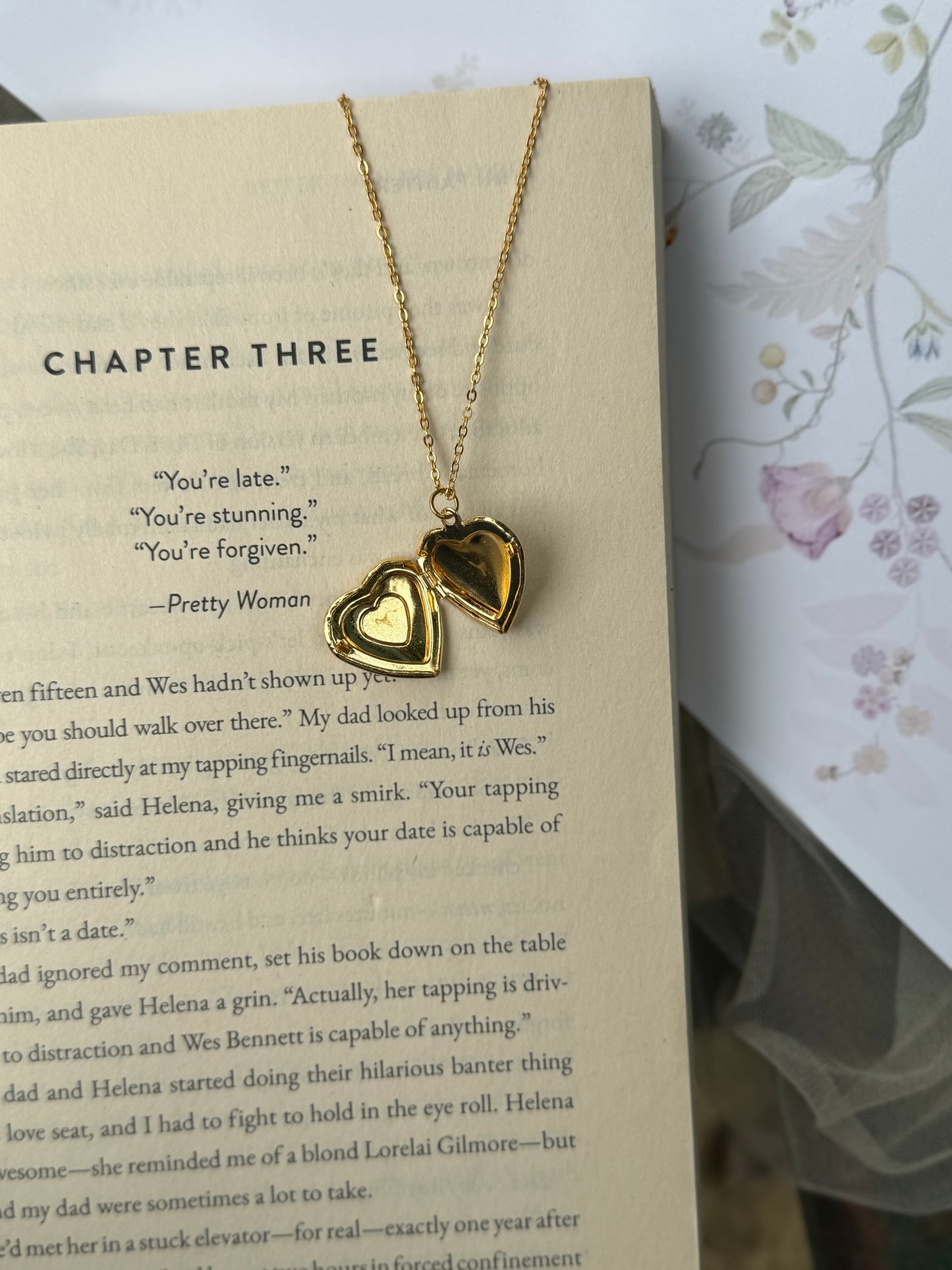Plum blossom heart locket