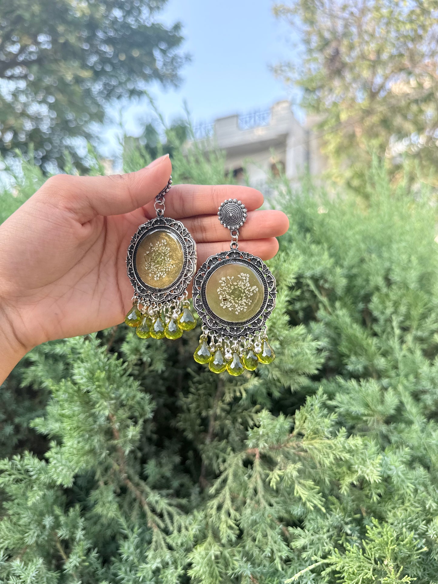 Nidaa silver jhumkas