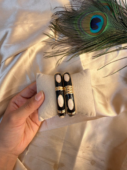 Gorg black enamel bangles