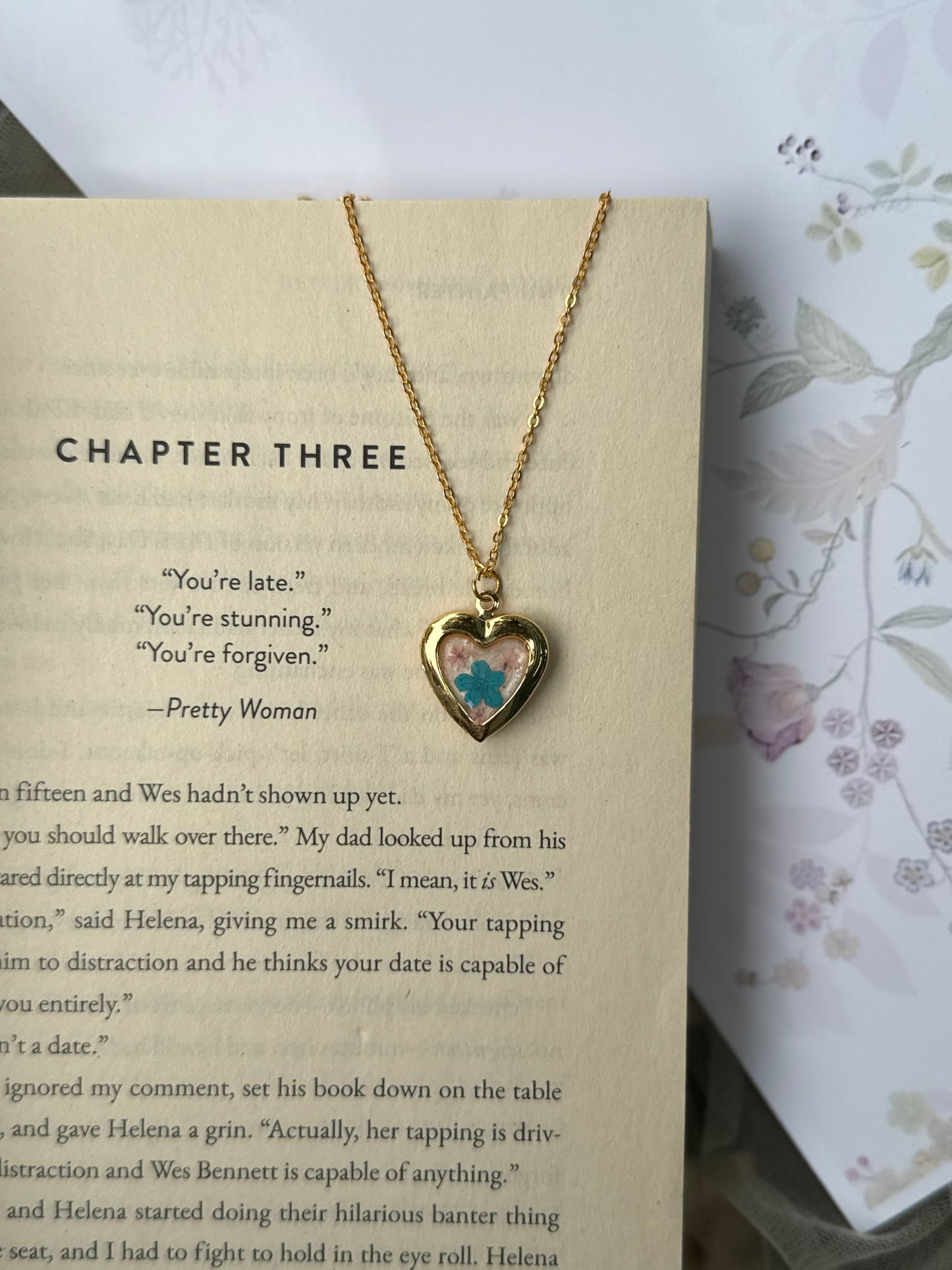 Plum blossom heart locket