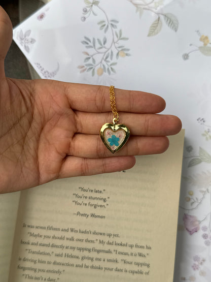 Plum blossom heart locket