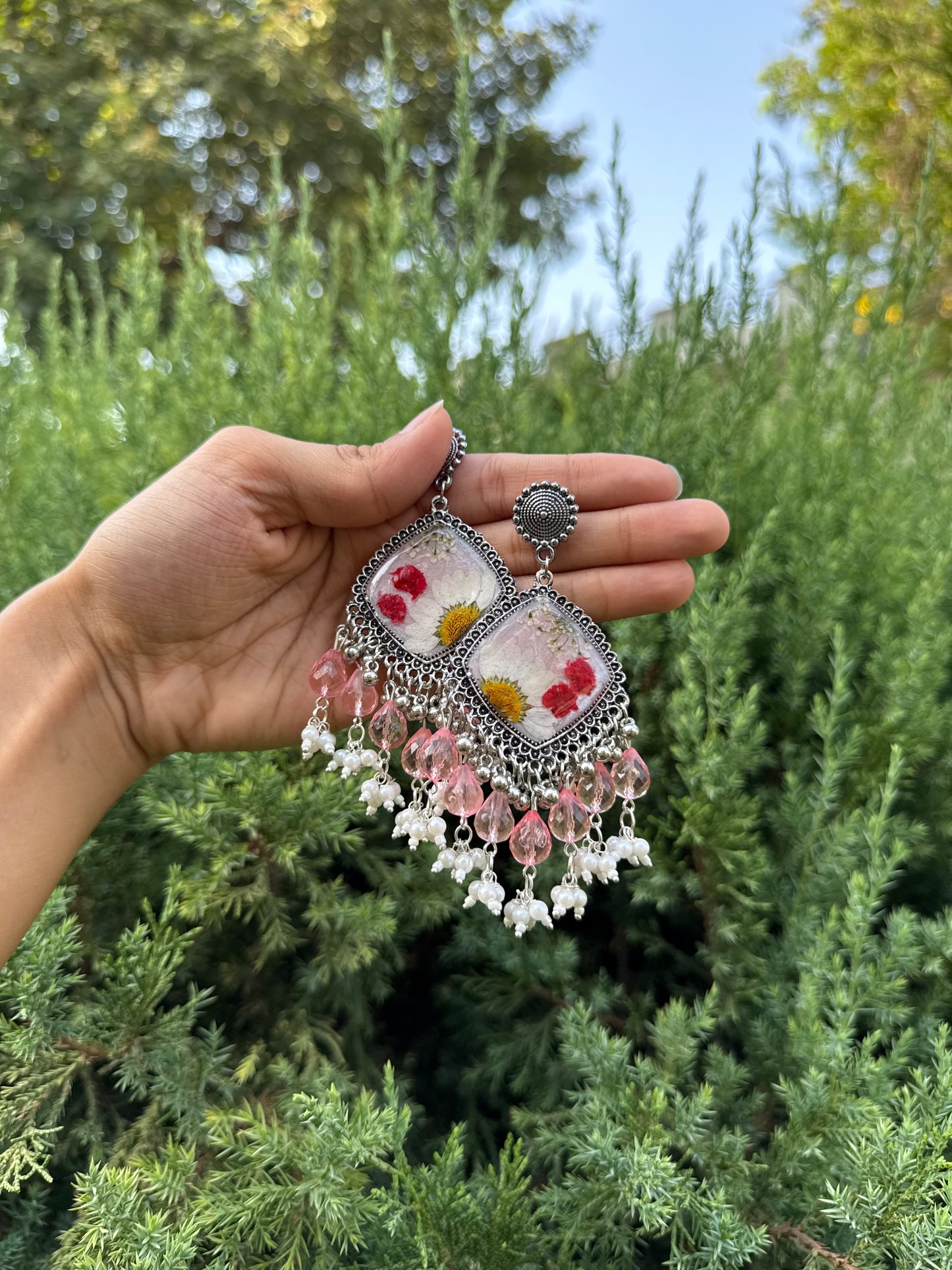 Snow daisy jhumkas