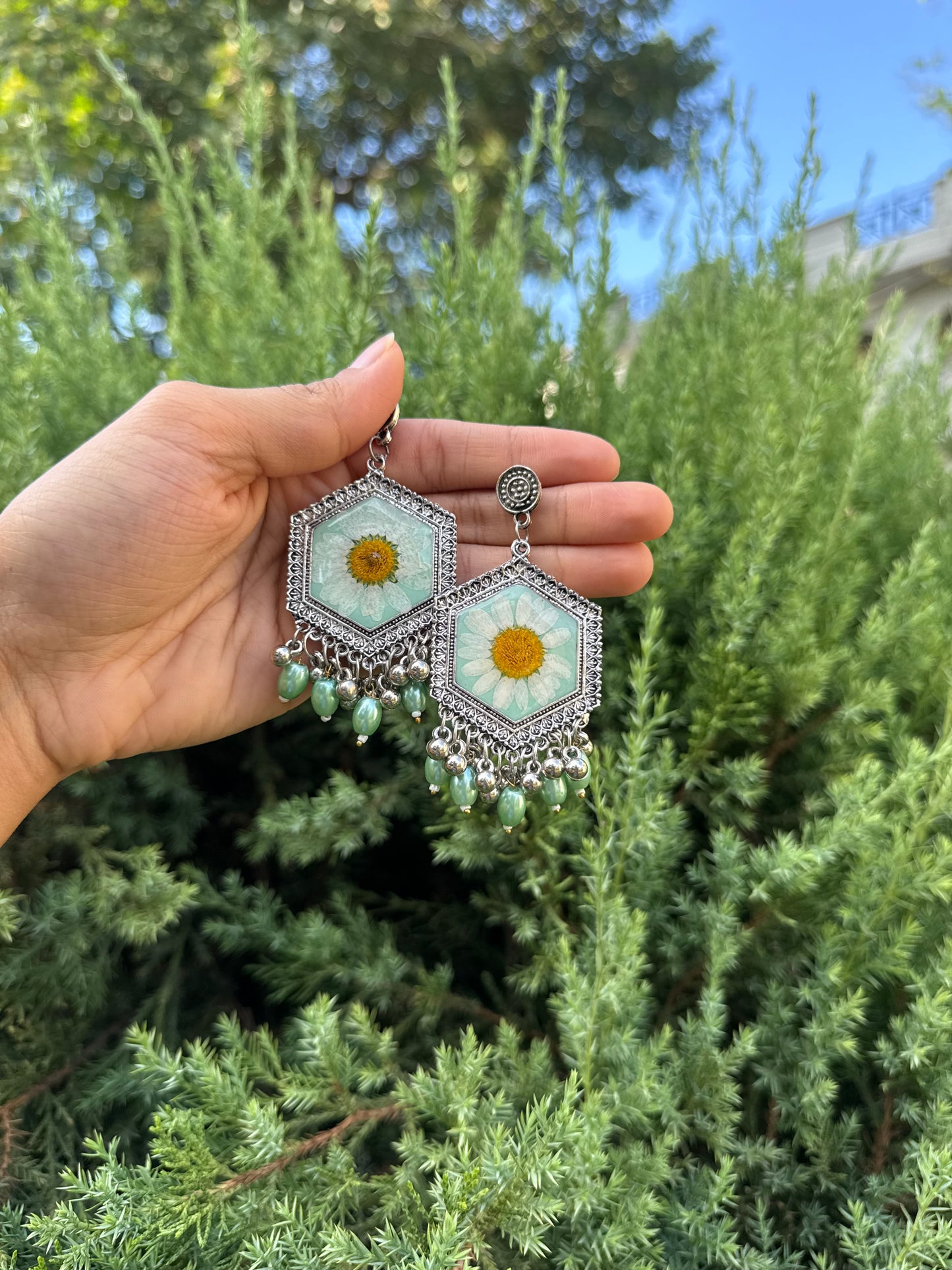 Green daisy jhumkas