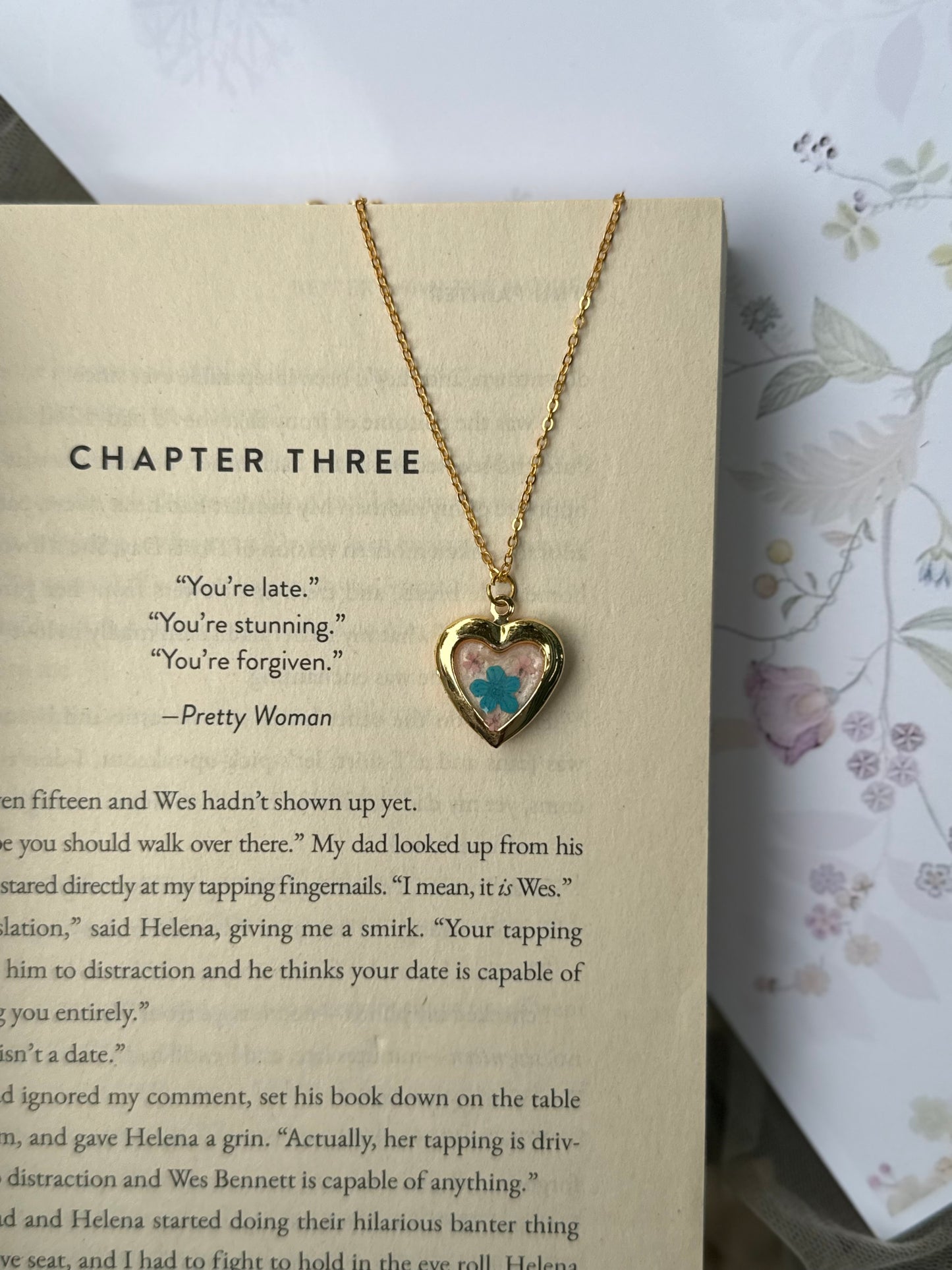 Plum blossom heart locket