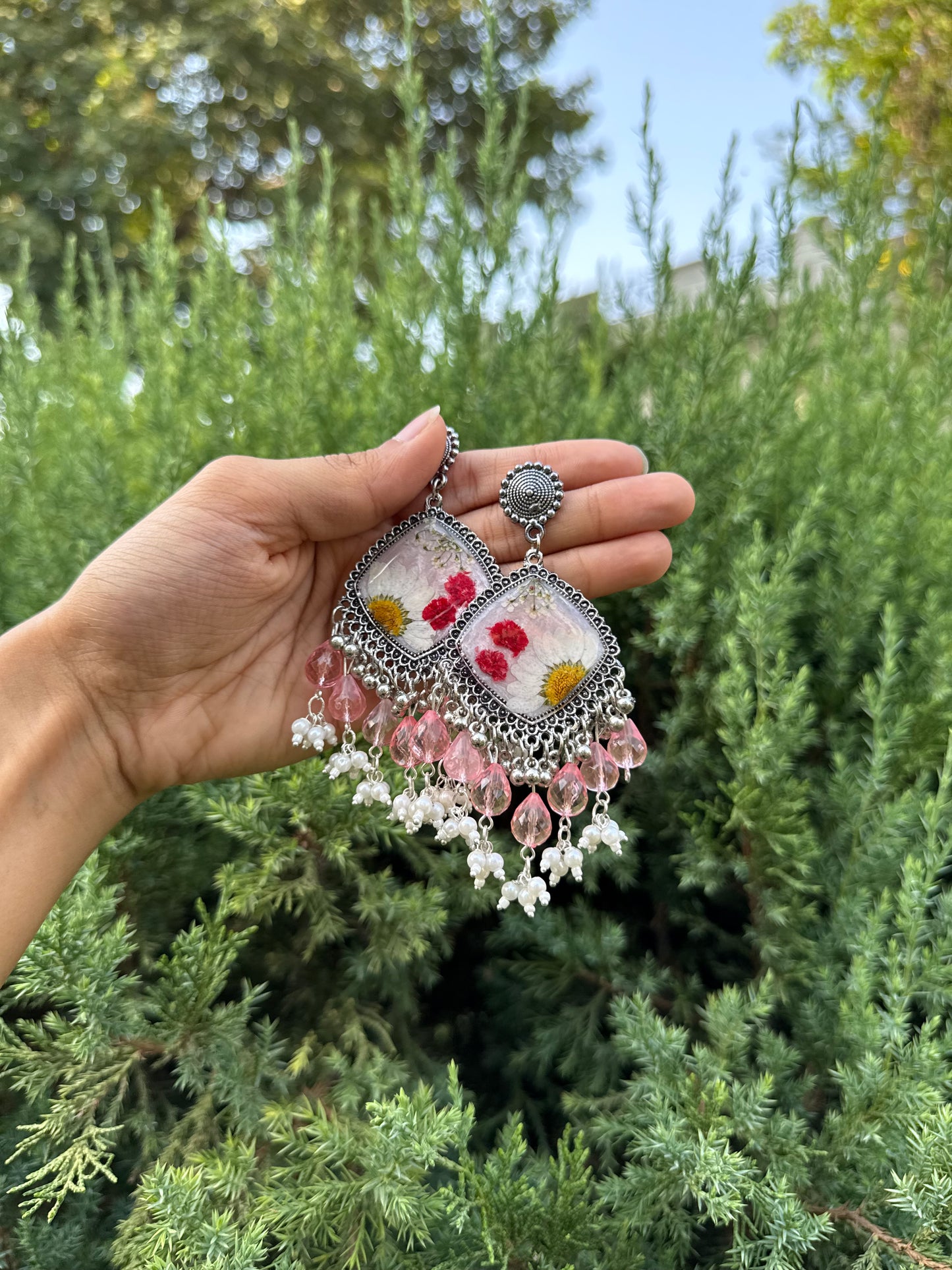 Snow daisy jhumkas