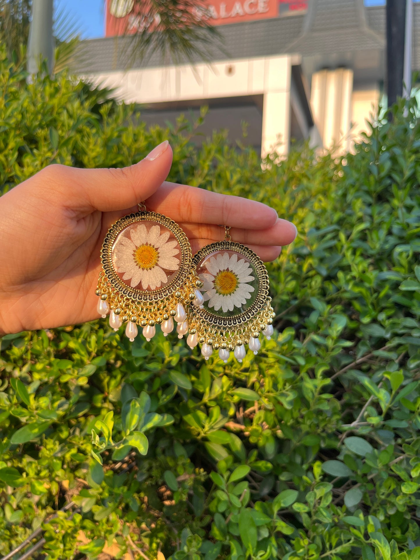 Pearly daisy jhumkas